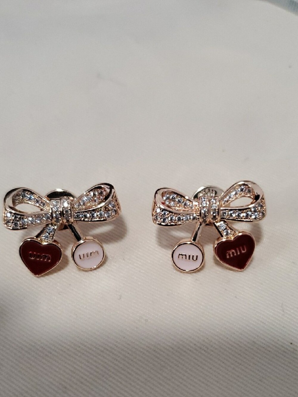 Miu Miu Rose Gold Crystal Bow Earrings with Pink & Burgundy Charms